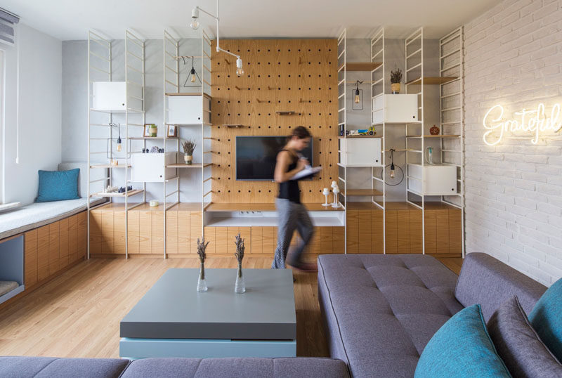 This apartment interior is filled with creative storage and decor