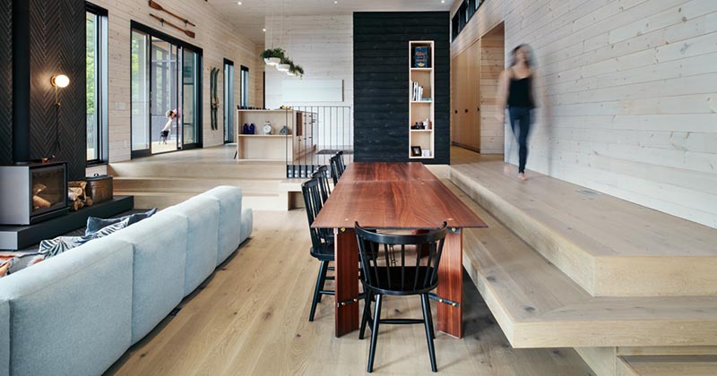 The Floor Turns Into Built-In Bench Seating In This Split Level Interior