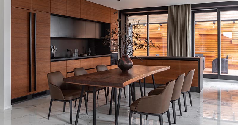 Warm Wood Is Contrasted With Black For The Material Palette In This Kitchen