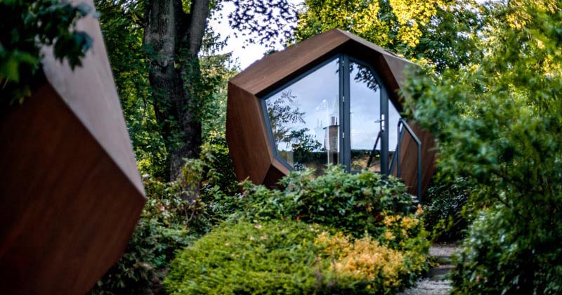 A Small Geometric Wood Cabin Was Designed As A Backyard Home Office