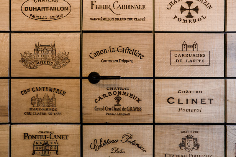 2100 Engraved Oak Panels Line The Walls Of This New Wine Shop