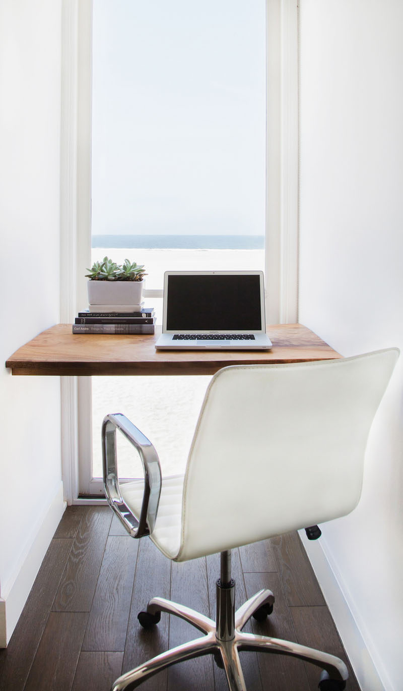 Small Home Office Idea - Make use of a small space and tuck your desk away  in an alcove