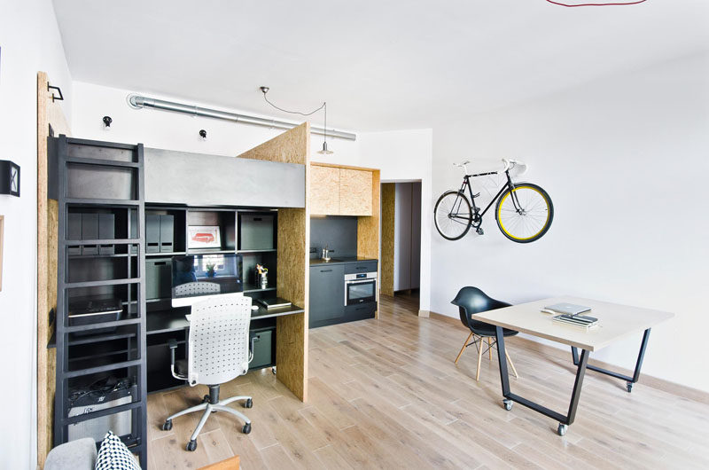This small apartment with lofted bed, has been designed as a live/work space for a design studio.