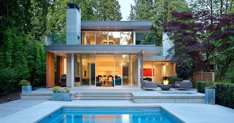 This new modern house in Vancouver is surrounded by tall evergreen trees