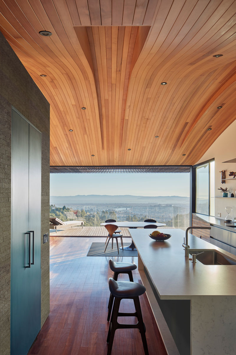 The Ceiling In This Modern House Echoes The Shape Of The Hillside It   Modern Wooden Ceiling Curved 090317 1003 04 