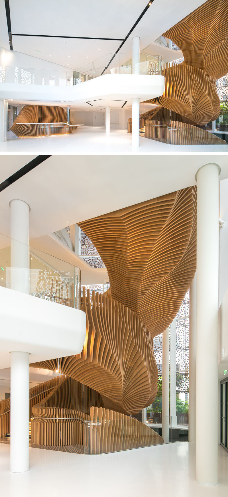 A Snake-like Sculptural Staircase Connects Four Floors Of This Office