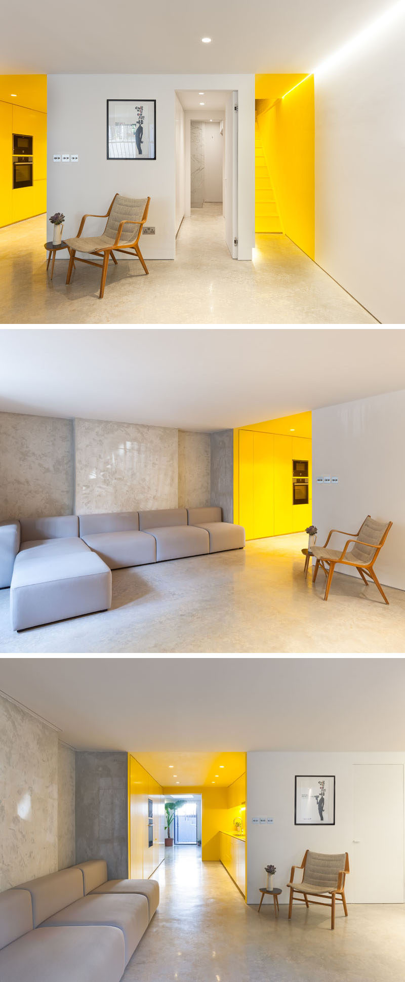 At the bottom of the yellow stairs is a living room that's bright white. A soft grey couch complements the polished, light-toned concrete that's been used for the floor. Off to the side is the entrance to a bold yellow kitchen. #Couch #Yellow #YellowStairs #YellowKitchen