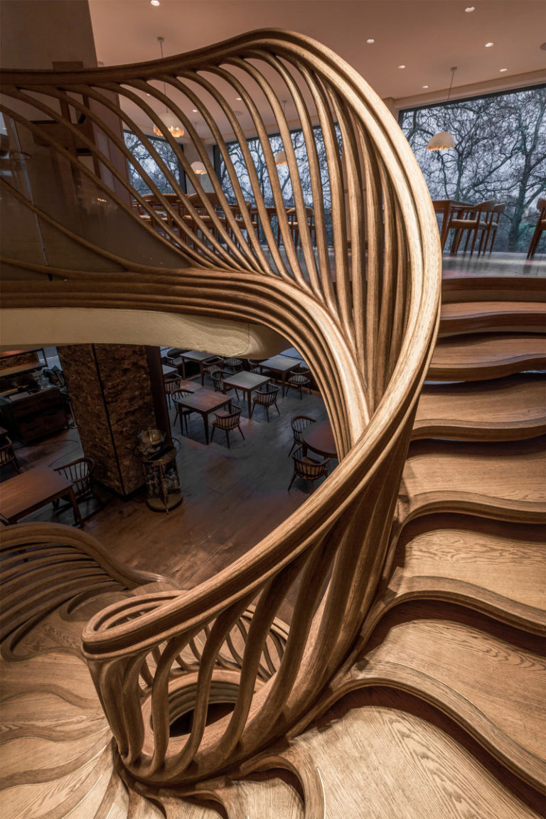 16 Photos Of An Amazingly Sculptural Wood Staircase Inside A Restaurant