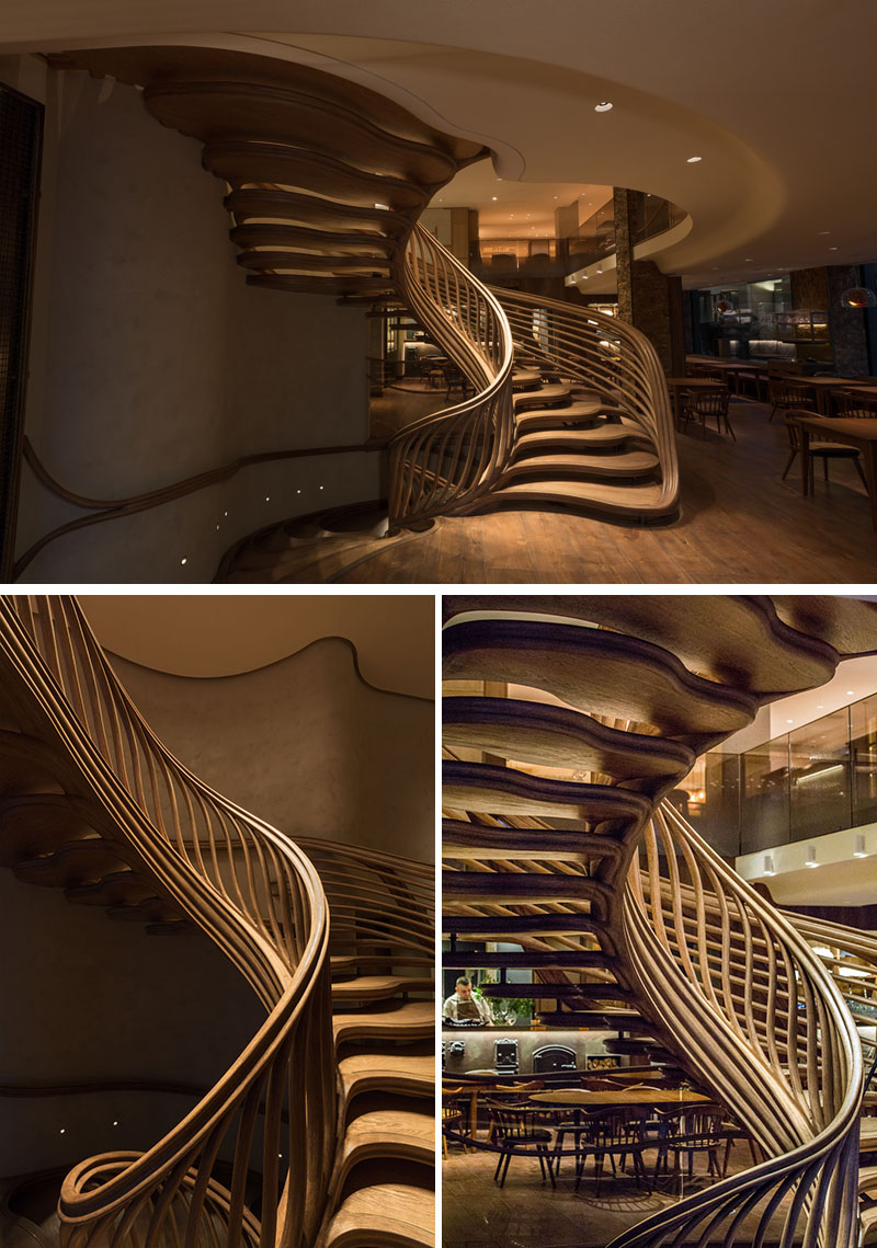 16 Photos Of An Amazingly Sculptural Wood Staircase Inside A Restaurant