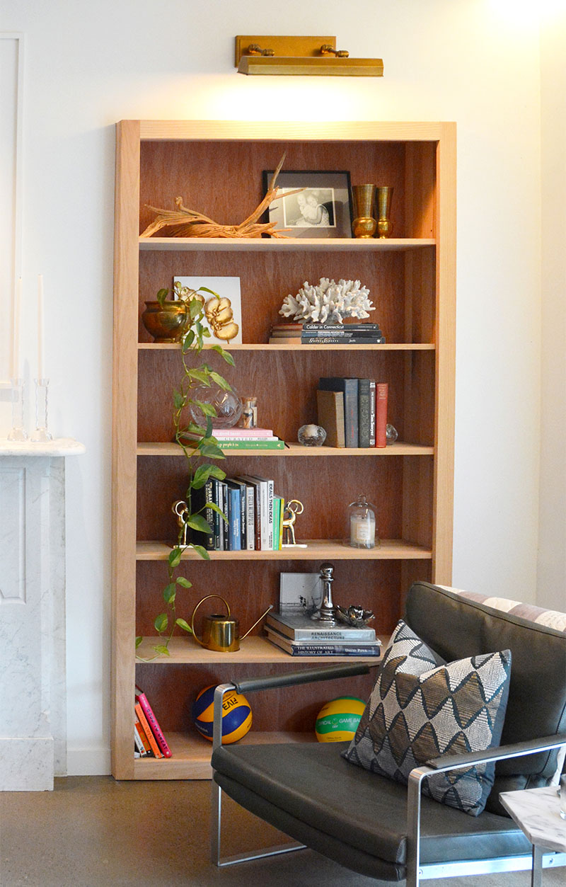 Bookshelf Design Ideas - Wood-Lined, Built-In Bookshelves Provide Extra