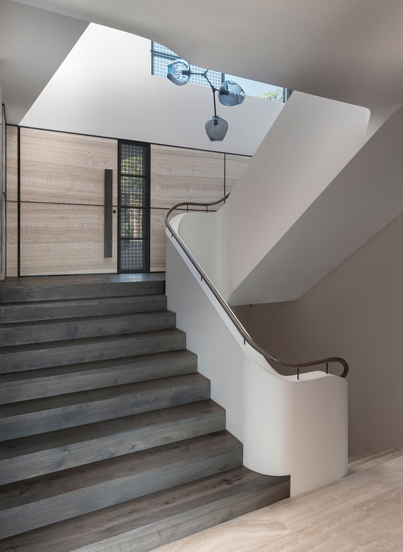 Sandstone Arches Provide Support For This Hillside House