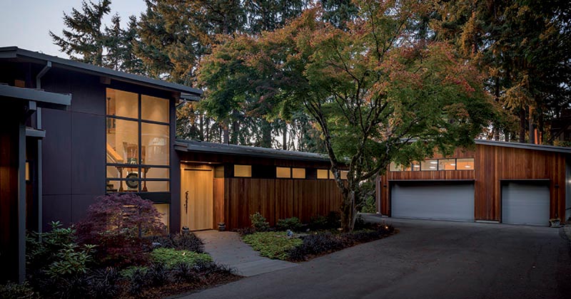 An Exterior Palette Of Wood And Steel Siding For A Modern House