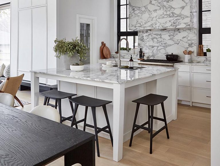 A Square Kitchen Island Includes Casual Seating In This Toronto Home   Modern White Marble Square Kitchen Island 200320 1112 01 768x578 