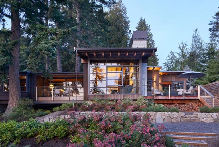 A Deep Roof Overhang Protects This House From The Rain