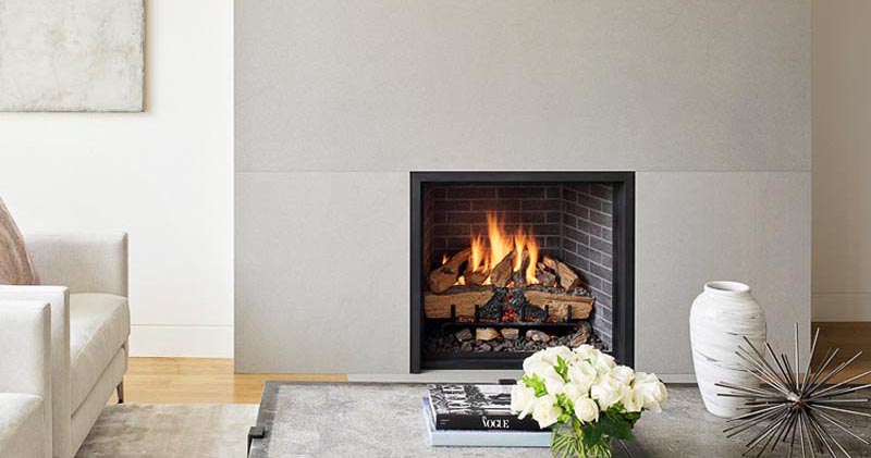 A Modern Minimalist Fireplace Surround Contributes To The Quiet Serenity Of This Living Room