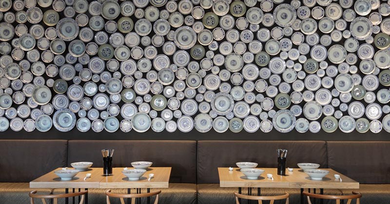 An Accent Wall Made From Bowls Is An Appropriate Choice For This Noodle Restaurant