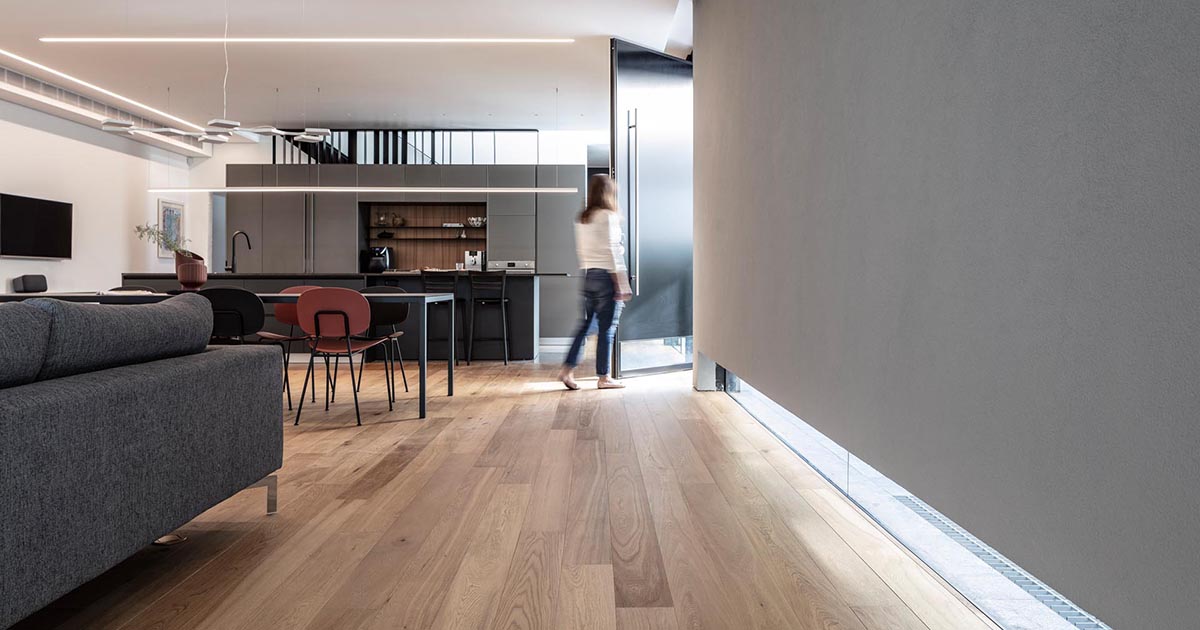 A Low Window Runs Along The Floor Of This House