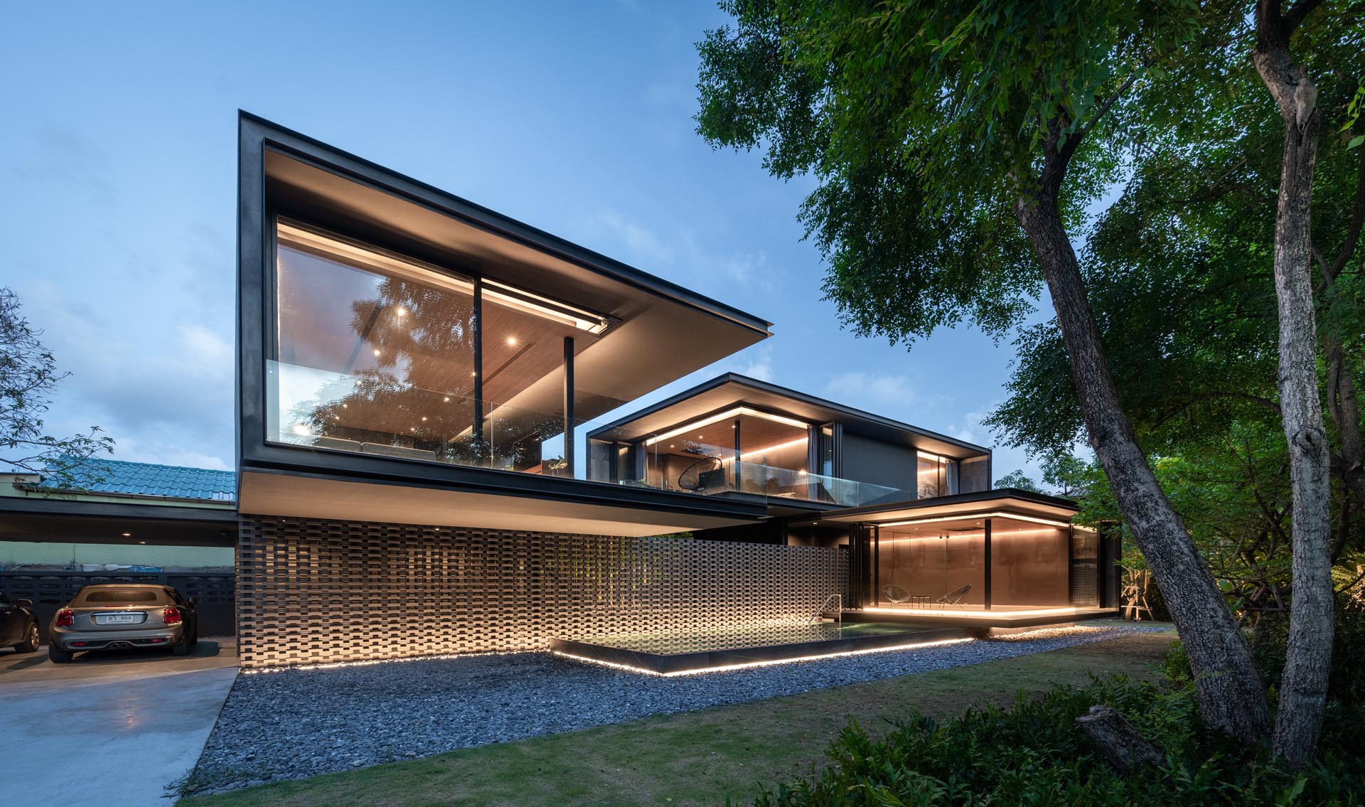 Lighting has been used to highlight the lines of this modern house.