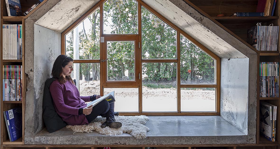 A Deep Window Seat Creates A Reading Space For This Architect's Office