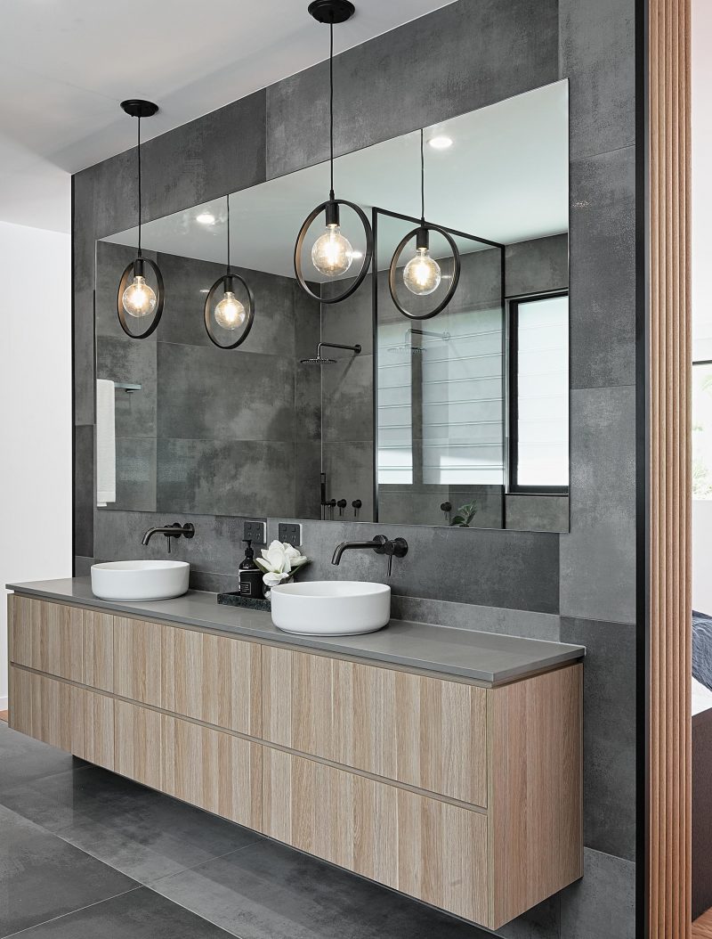 A Cloudy Grey Tile Sets The Palette For This Bathroom