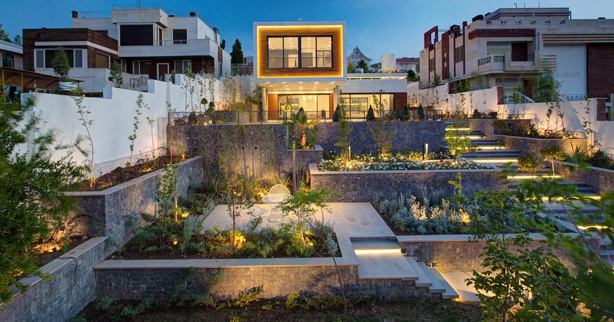 Terraced Landscaping Provides This Home With Multiple Gardens