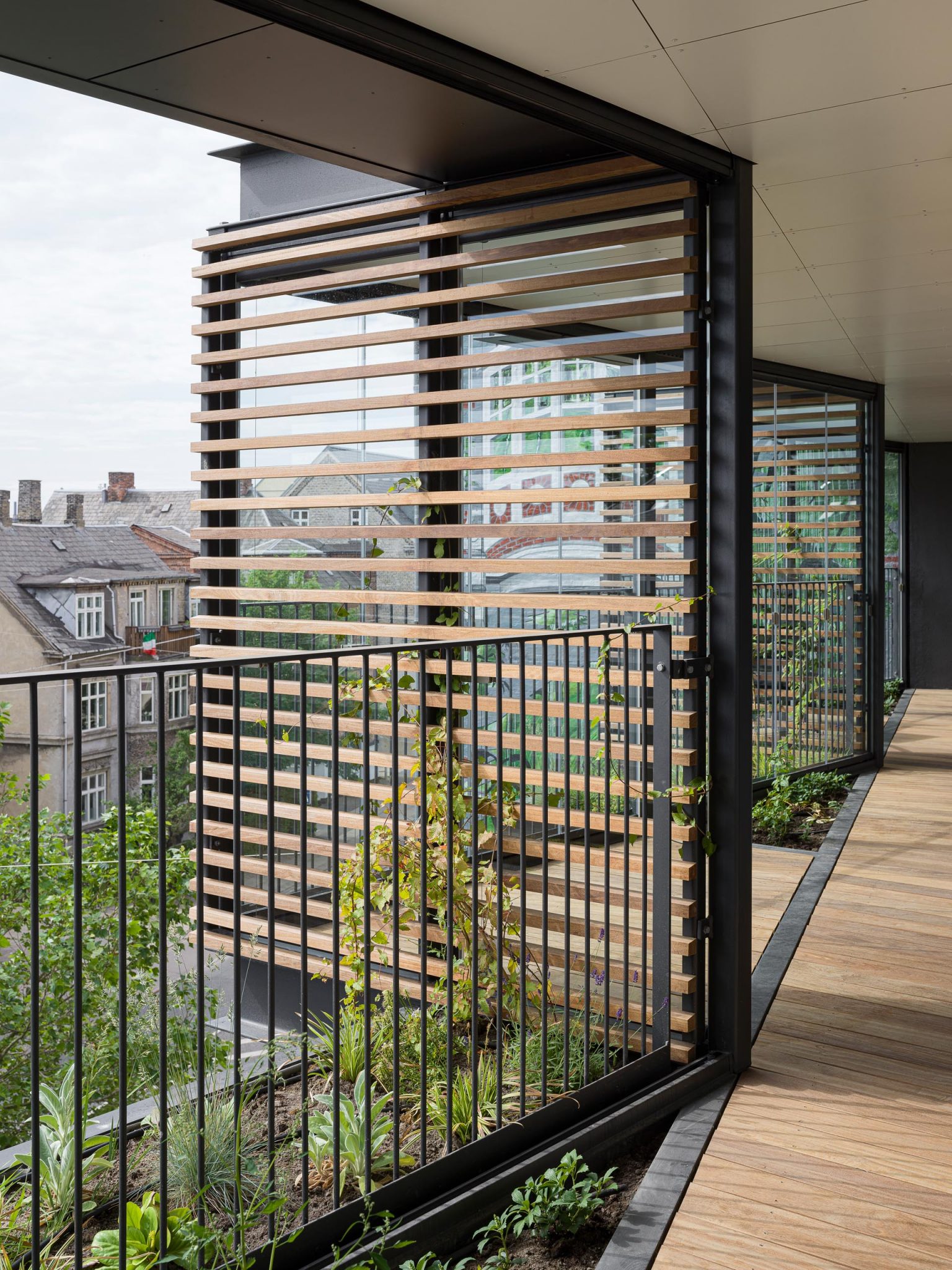 small-covered-balconies-give-this-apartment-building-a-unique-look