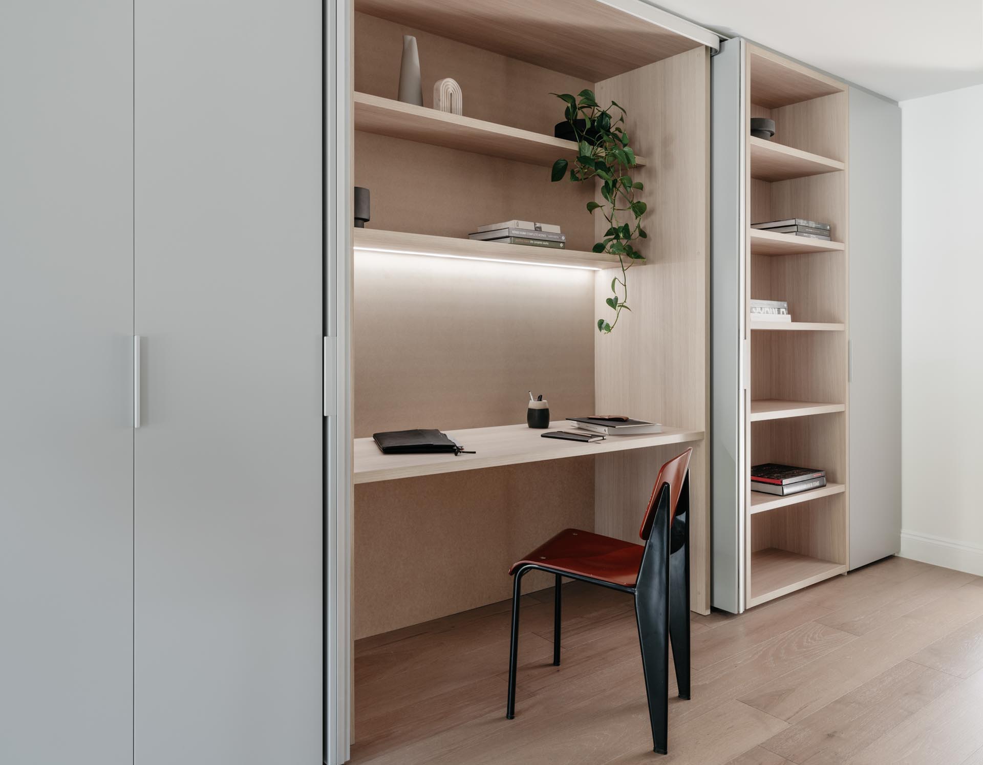 A Home Office In A Wall Of Cabinets Is A Good Idea For Apartment Living