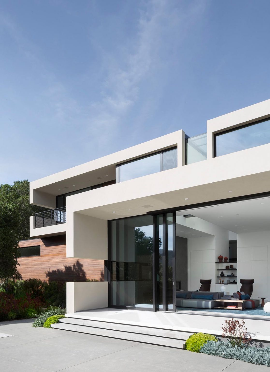 Windows Slice Through The Solid Exterior Of This Modern Home In California