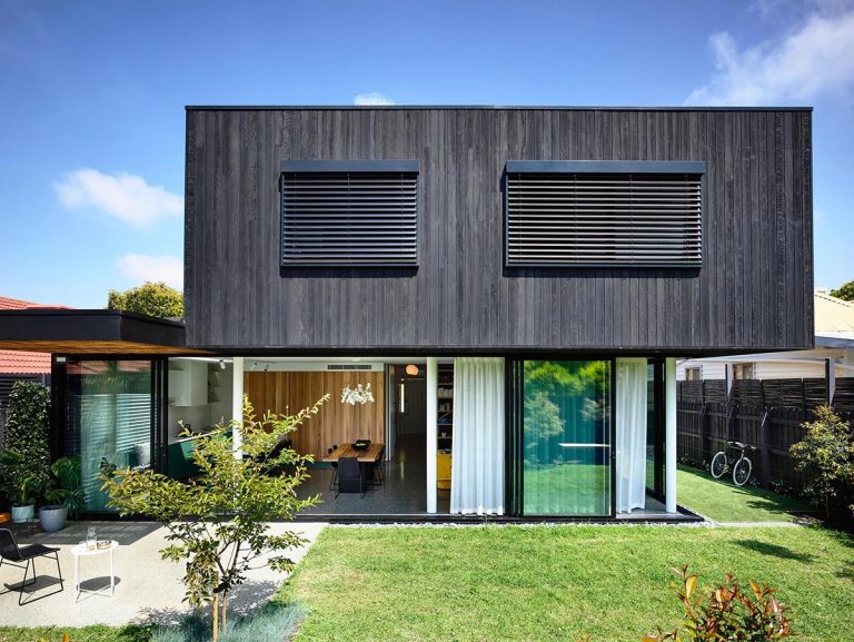 Charred Wood Siding And Glass Walls Enclose The Modern Interior Of This ...