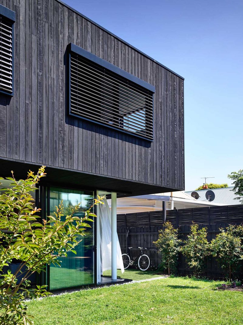 Charred Wood Siding And Glass Walls Enclose The Modern Interior Of This ...