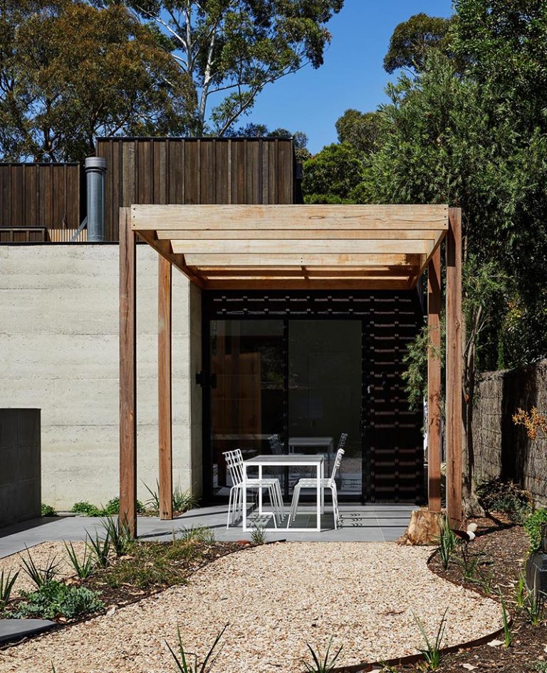 An Exterior Of Blackbutt Timber Hides The Bright White Interior Of This 