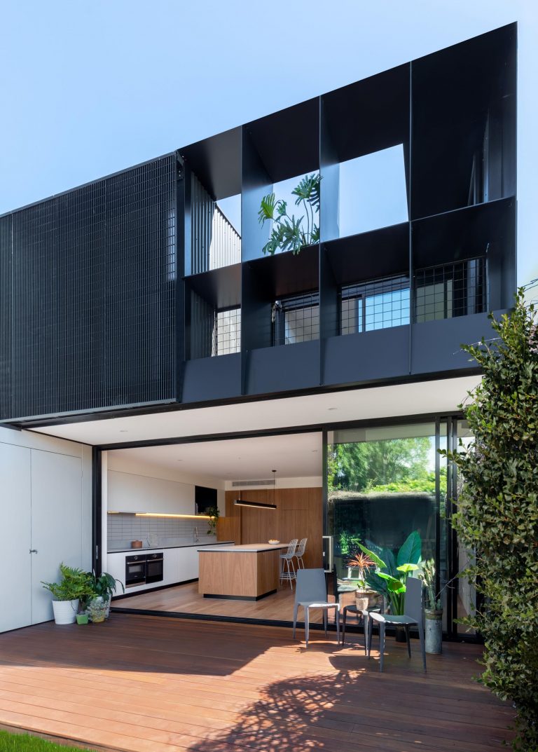 A Dark Gray Metal Extension Adds A Modern Element To This Heritage House