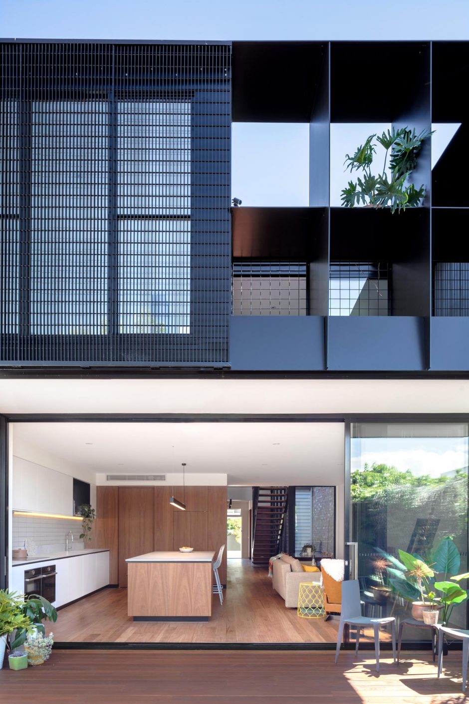 A Dark Gray Metal Extension Adds A Modern Element To This Heritage House