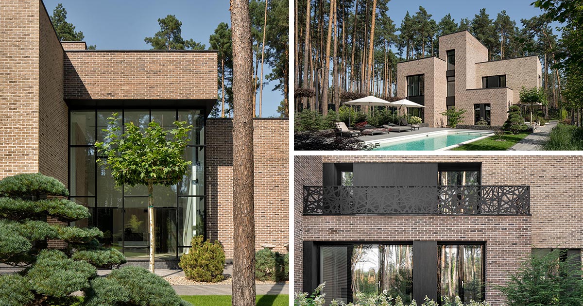 The Modern Brick Exterior Of This House Stands Out From The Forest And Landscaped Gardens It's Surrounded By