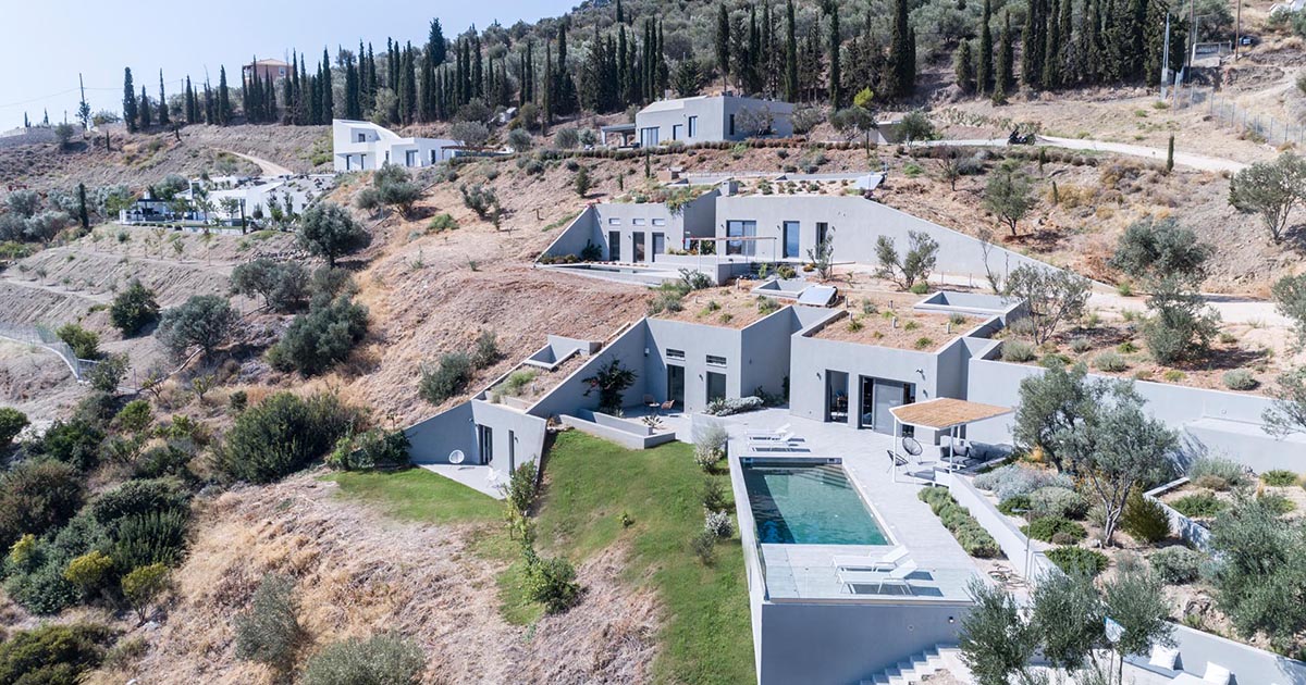 Three Homes With Green Roofs Blend Into This Hillside In Greece