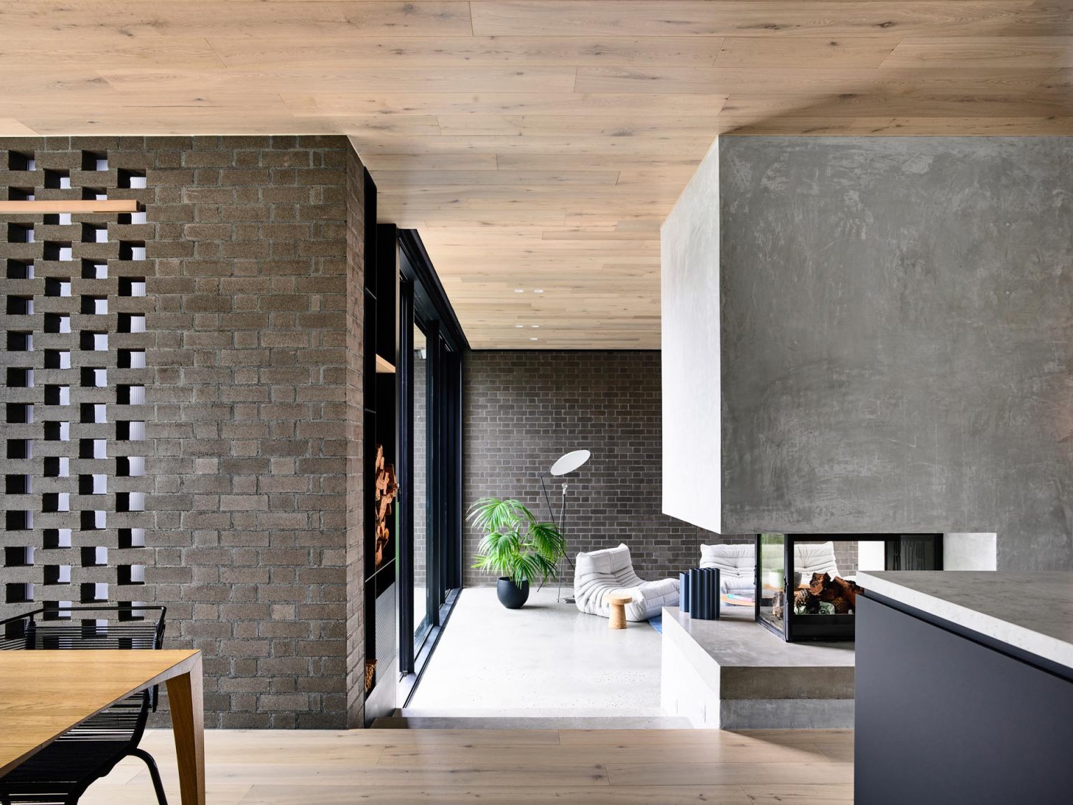 A Dark Brick Addition Creates More Living Space For This Home