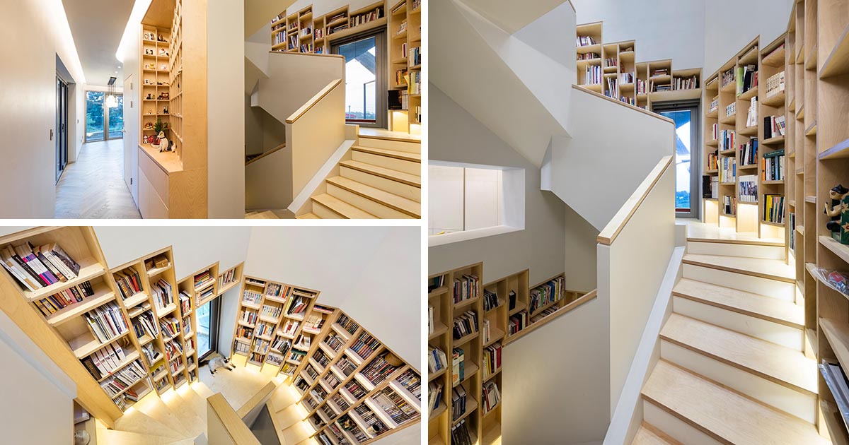A Built-In Bookshelf Follows The Stairs Inside This Home