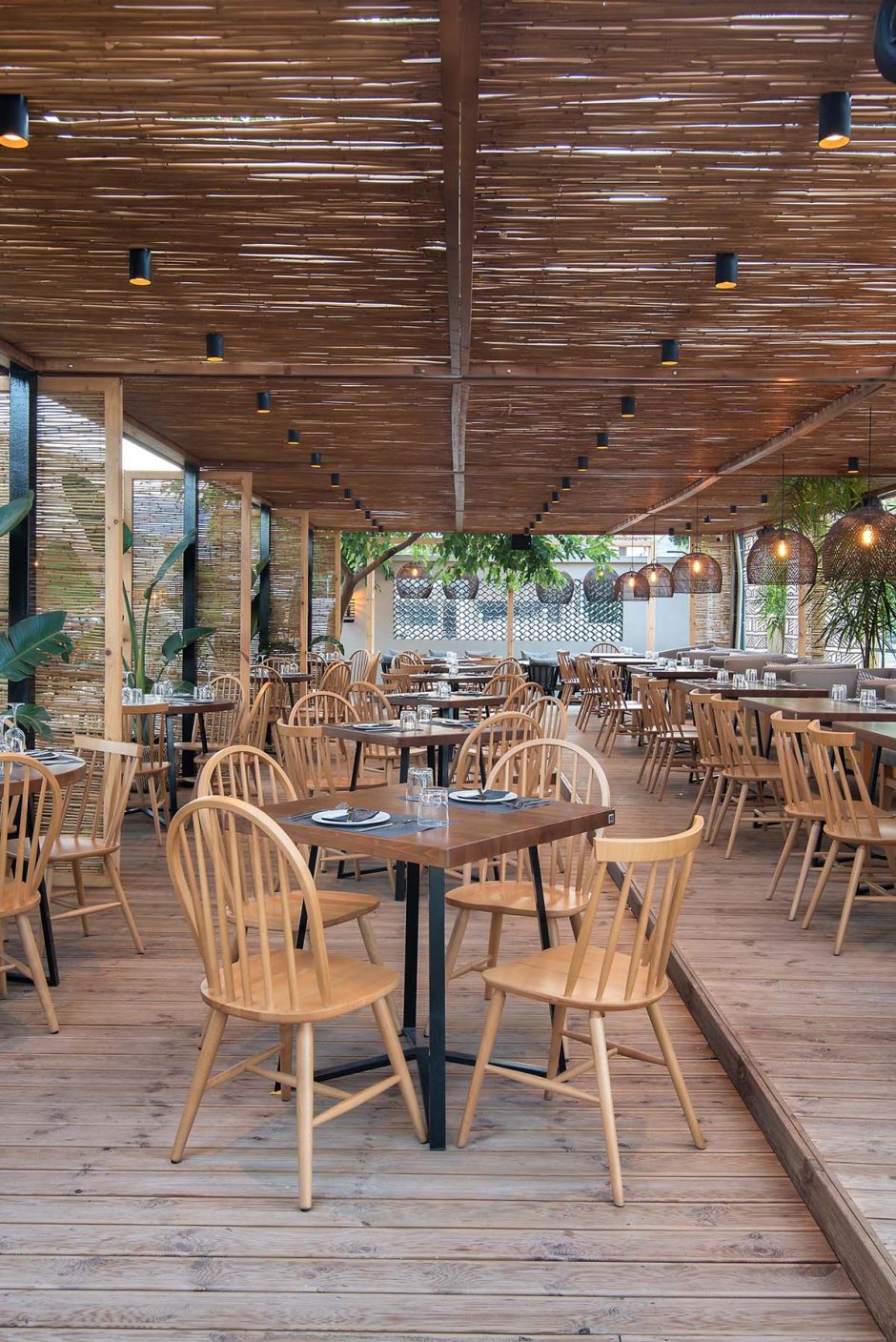 Screens Made From Reeds Add To The Beach Aesthetic Of This Bar And ...