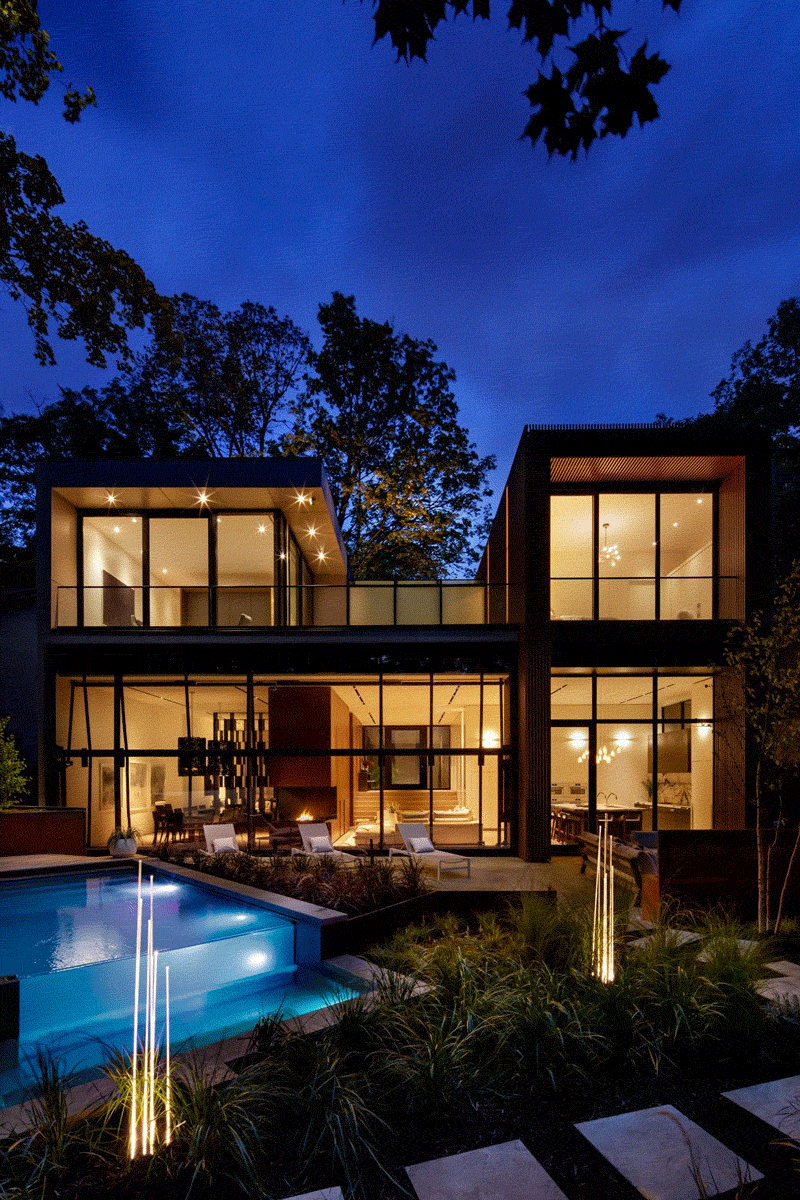 A 40 Foot Glass Wall Folds Open To Connect The Interior And Exterior Spaces Of This Home