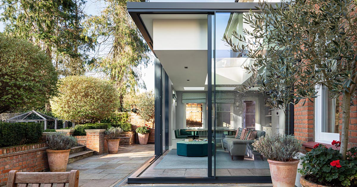 A Glass Enclosed Extension Adds A Light-Filled Living Space To This Home