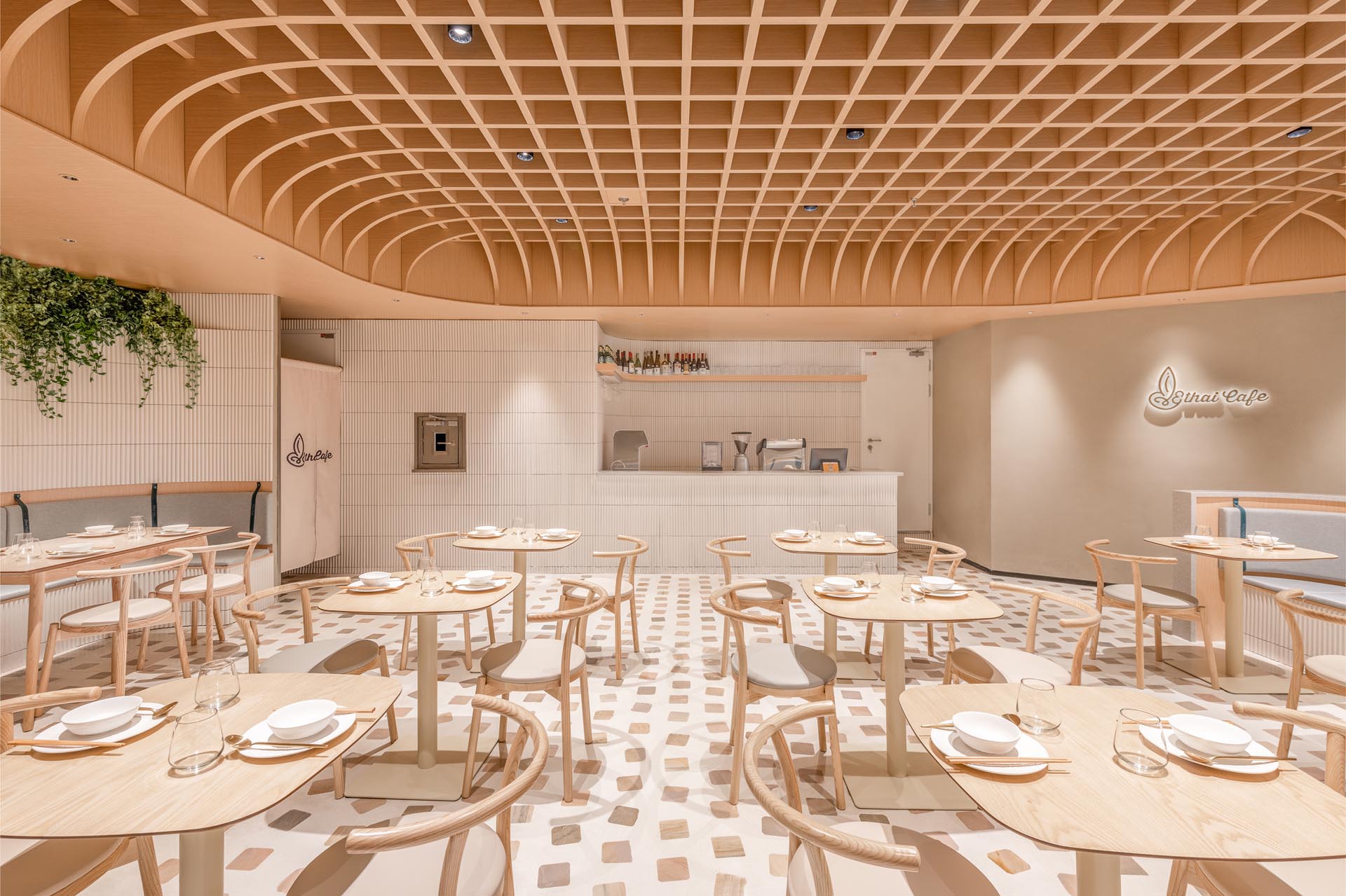 A Grid-Shaped Wood Ceiling Covers This Cafe In China