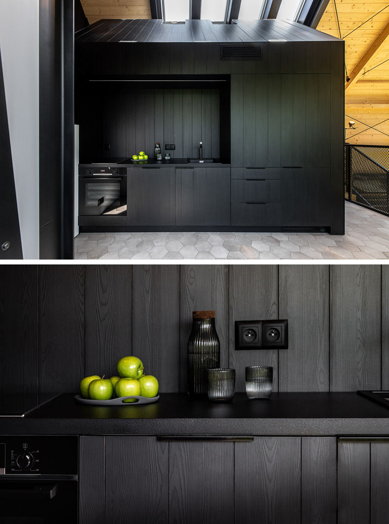 Architecture and interior design firm mode:lina, designed a small group of resort houses with black kitchens.