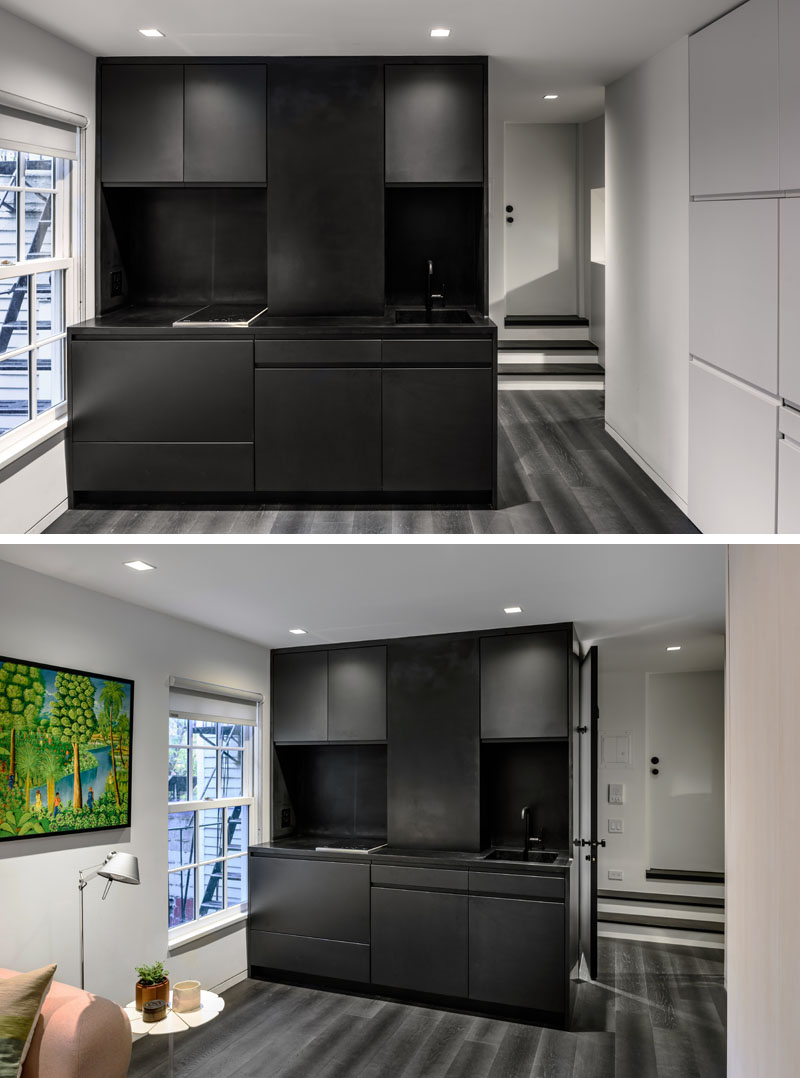 Architecture firm MKCA have completed the design of a small 225 sq ft (20 sqm) apartment in New York City with a black kitchen.