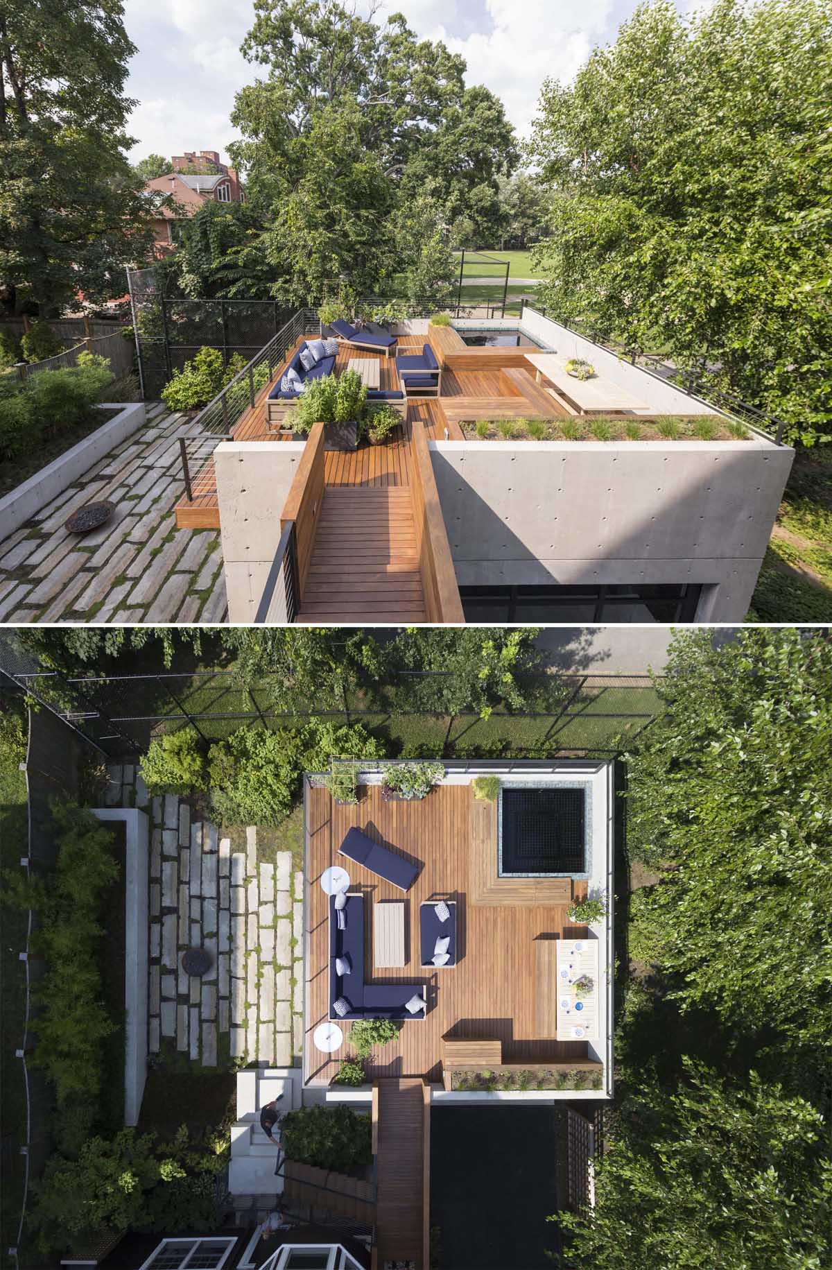 This Garage Was With A Rooftop Deck That Includes A Hot Tub
