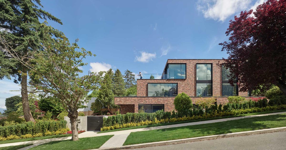 This Modern Brick House Terraces Down The Hillside