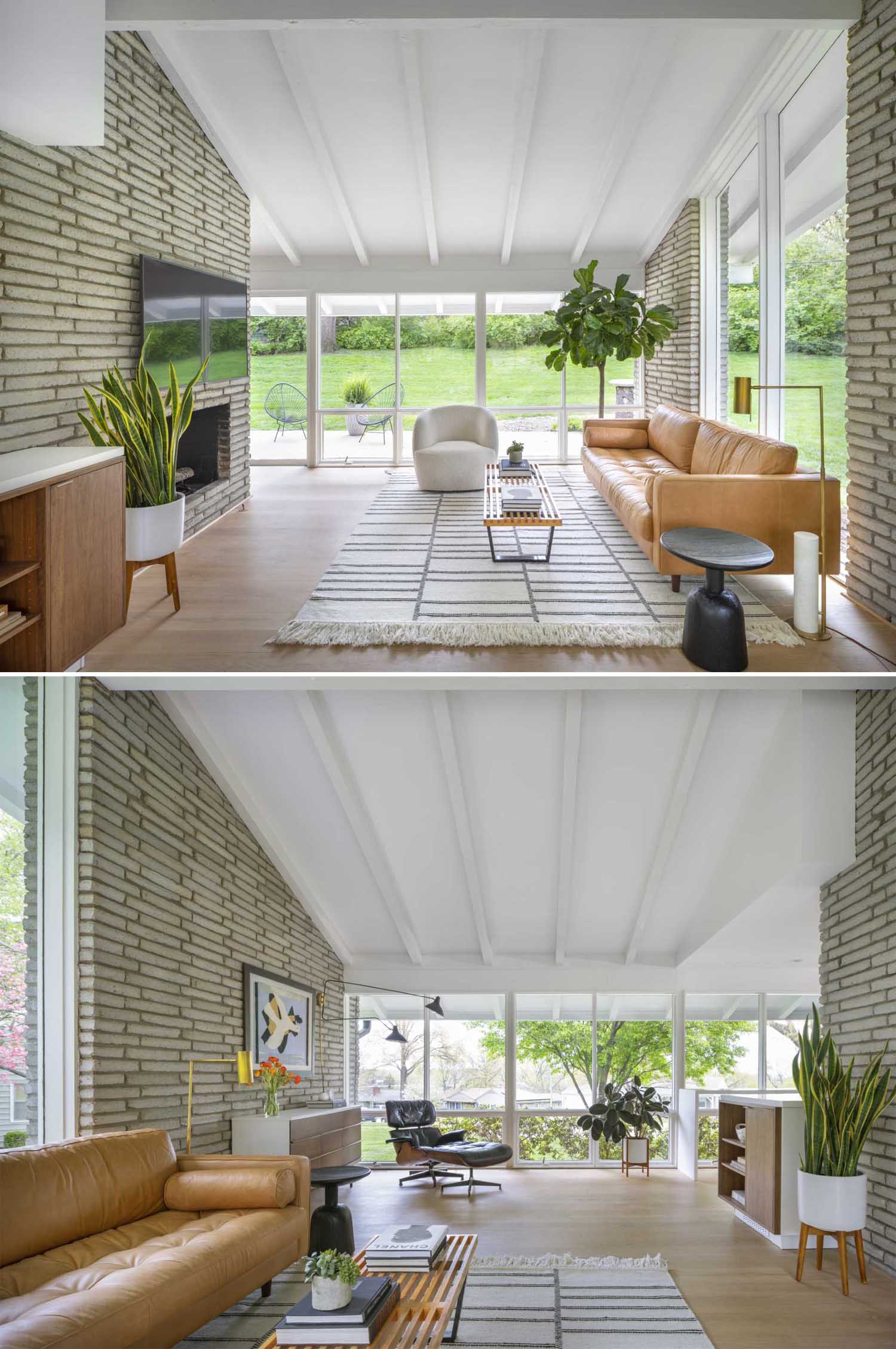 The minimally furnished living room of a renovated mid-century modern house, looks out towards the rear patio, while the other side of the living room opens up into a sitting area that overlooks the street.