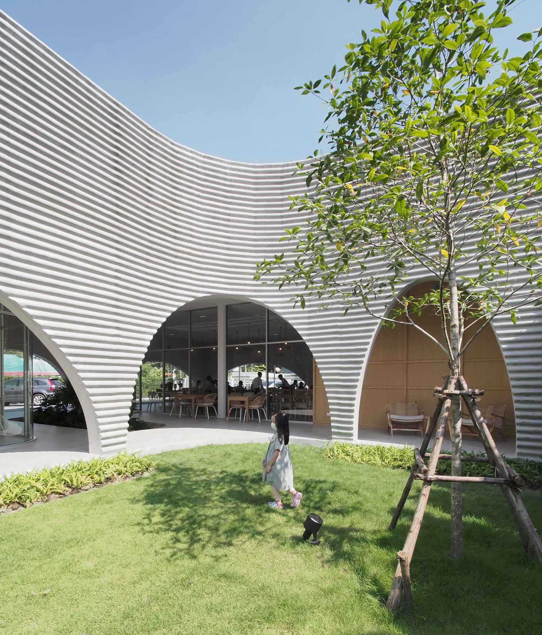 Corrugated Concrete Covers The Exterior Of This Restaurant In Thailand