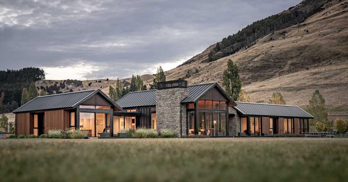 A Material Palette Of Cedar, Stone, And Metal Contribute To The Charm Of This Farmhouse-Inspired Home