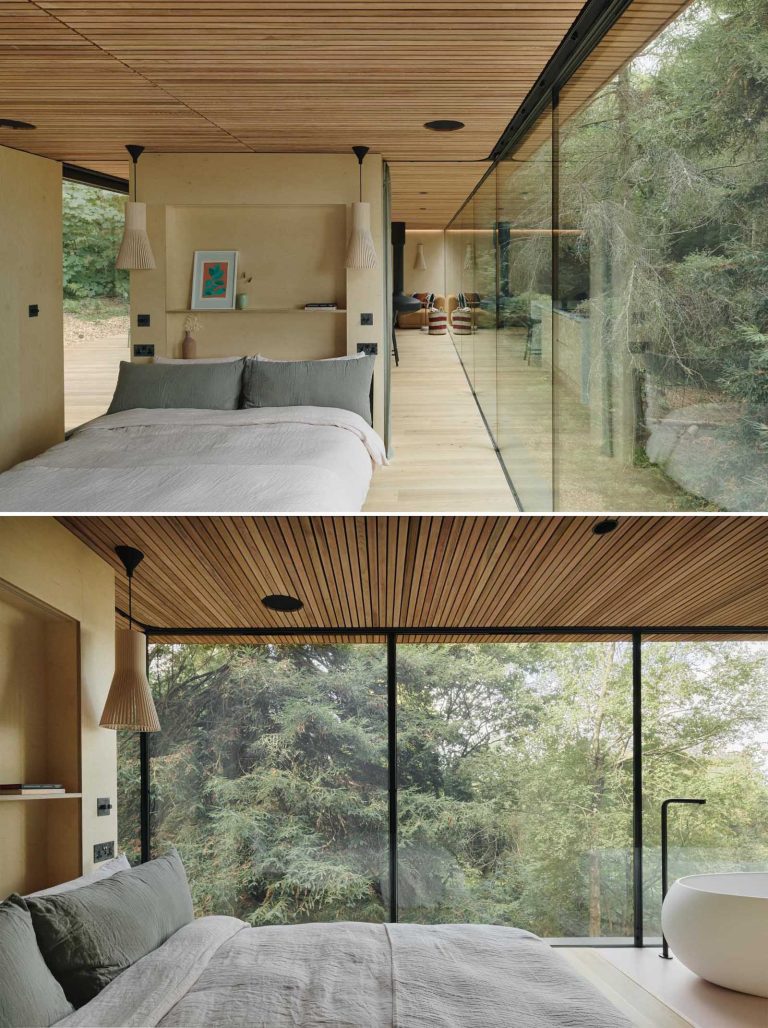 This Wood Covered House Hovers Above The Hillside In The Forest