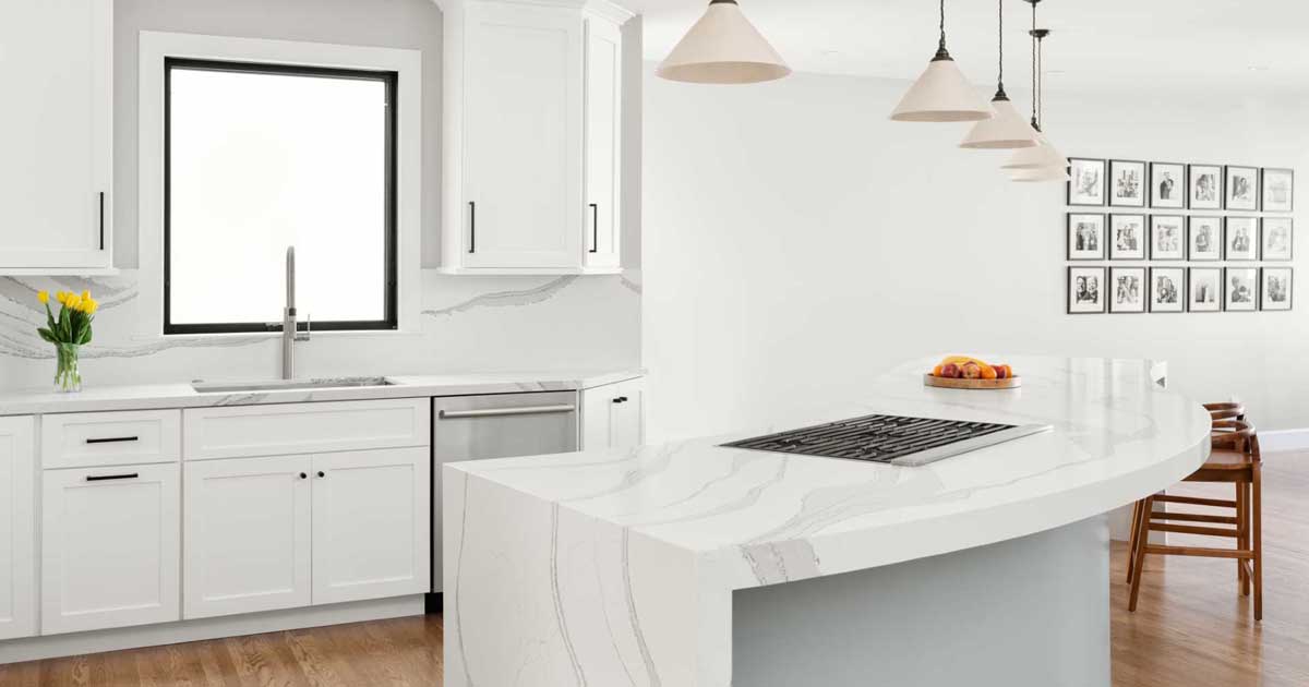 An S-Shaped Kitchen Island Flows Through This Remodeled Home